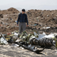 FILE PHOTO: American civil aviation and Boeing investigators search through the debris at the scene of the Ethiopian Airlines Flight ET 302 plane crash, near the town of Bishoftu, southeast of Addis Ababa, Ethiopia March 12, 2019.